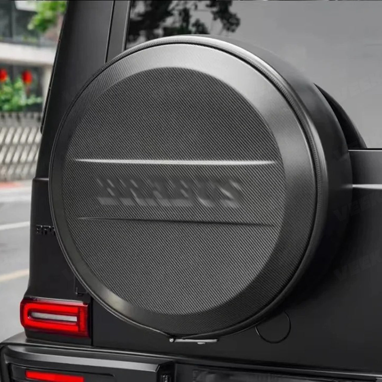 Custom-style carbon fiber spare tire cover for G Wagon